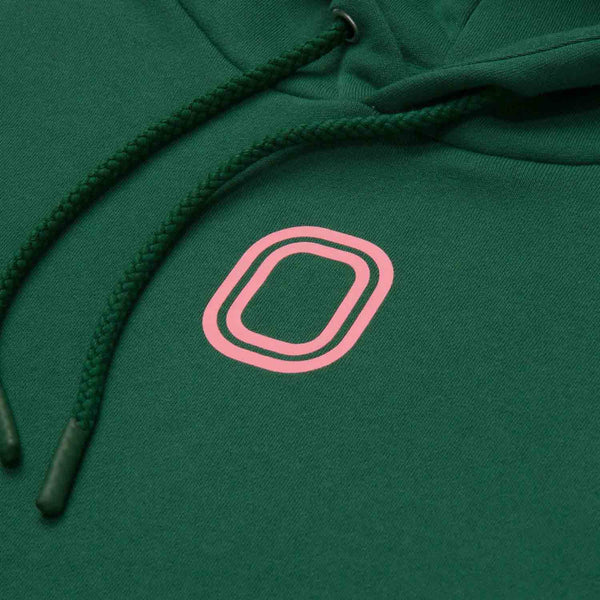 Up close view of emblem on the Overtime Classic Hoodie.