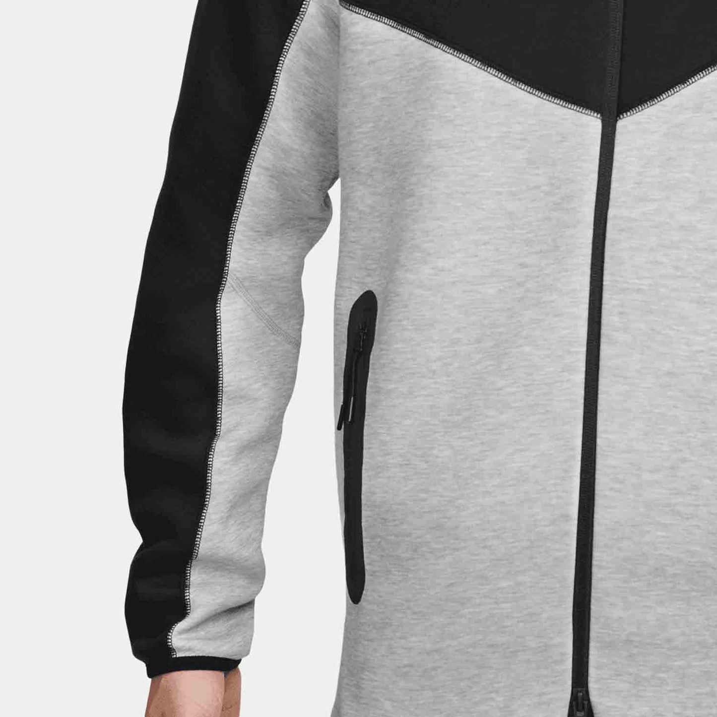 Up close view of zip up pocket on the Men's Full-Zip Hoodie Sportswear Tech Fleece Windrunner.