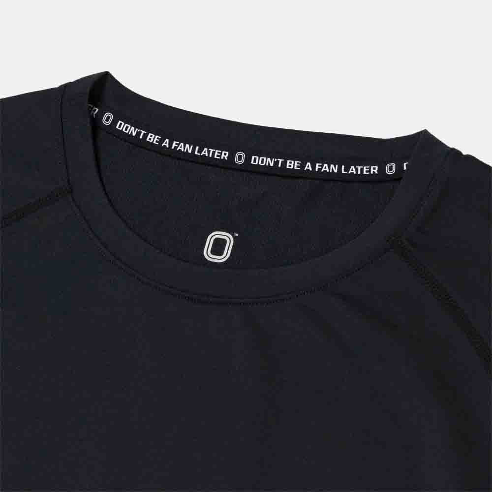 Up close view of emblem on the Overtime Kids' Valid Compression Tee.