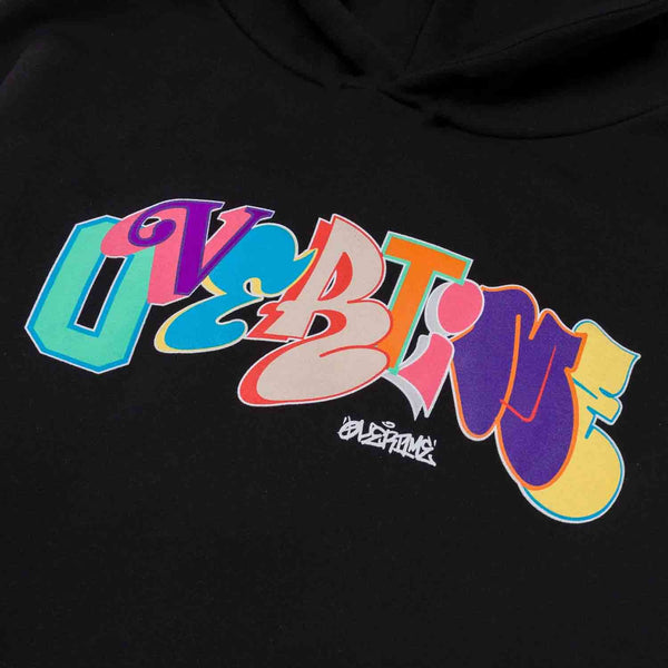 Up close view of the logo on the Overtime Kids' Vandal Tag Hoodie.