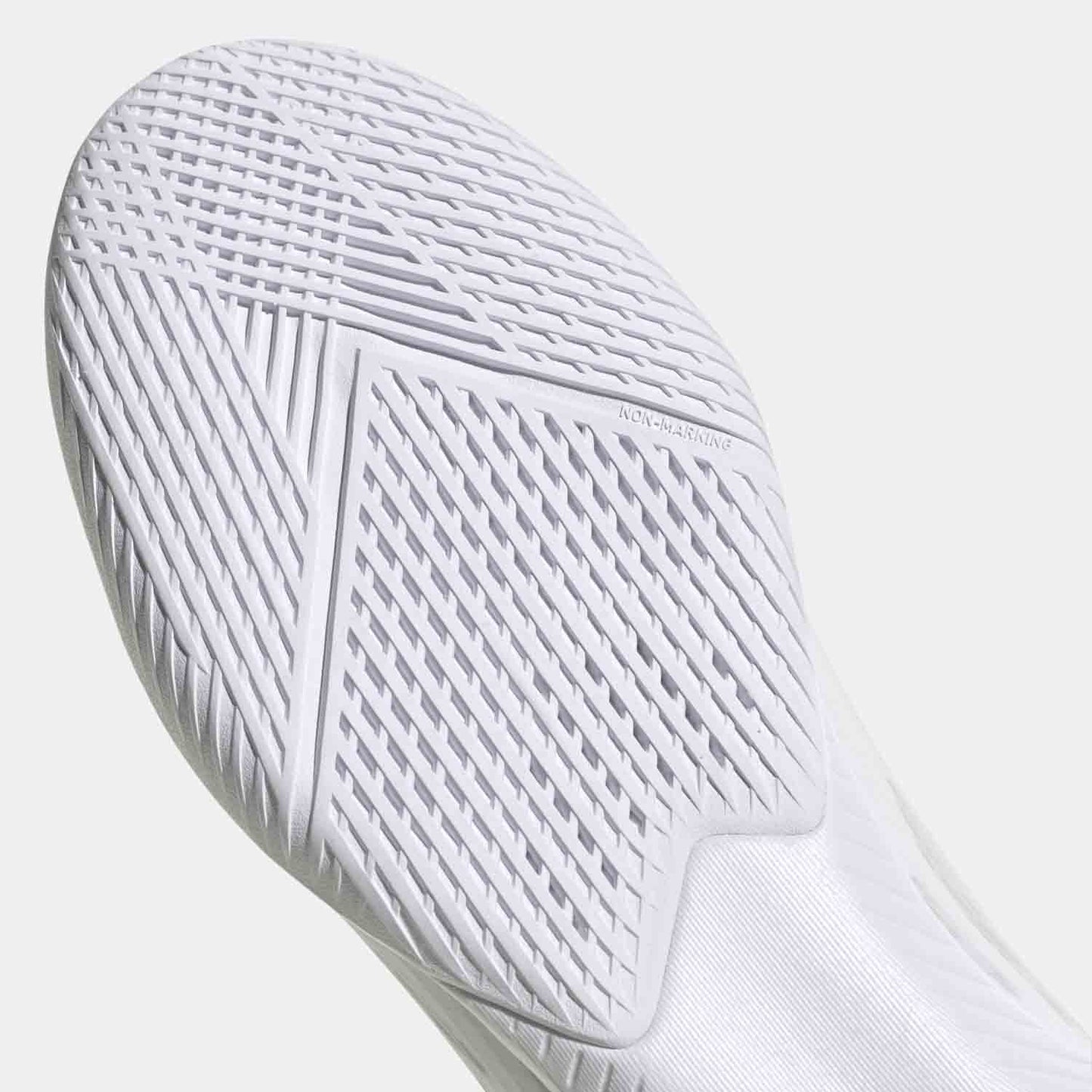 Up close bottom view of Adidas Men's X Speedflow Indoor Soccer Shoes.