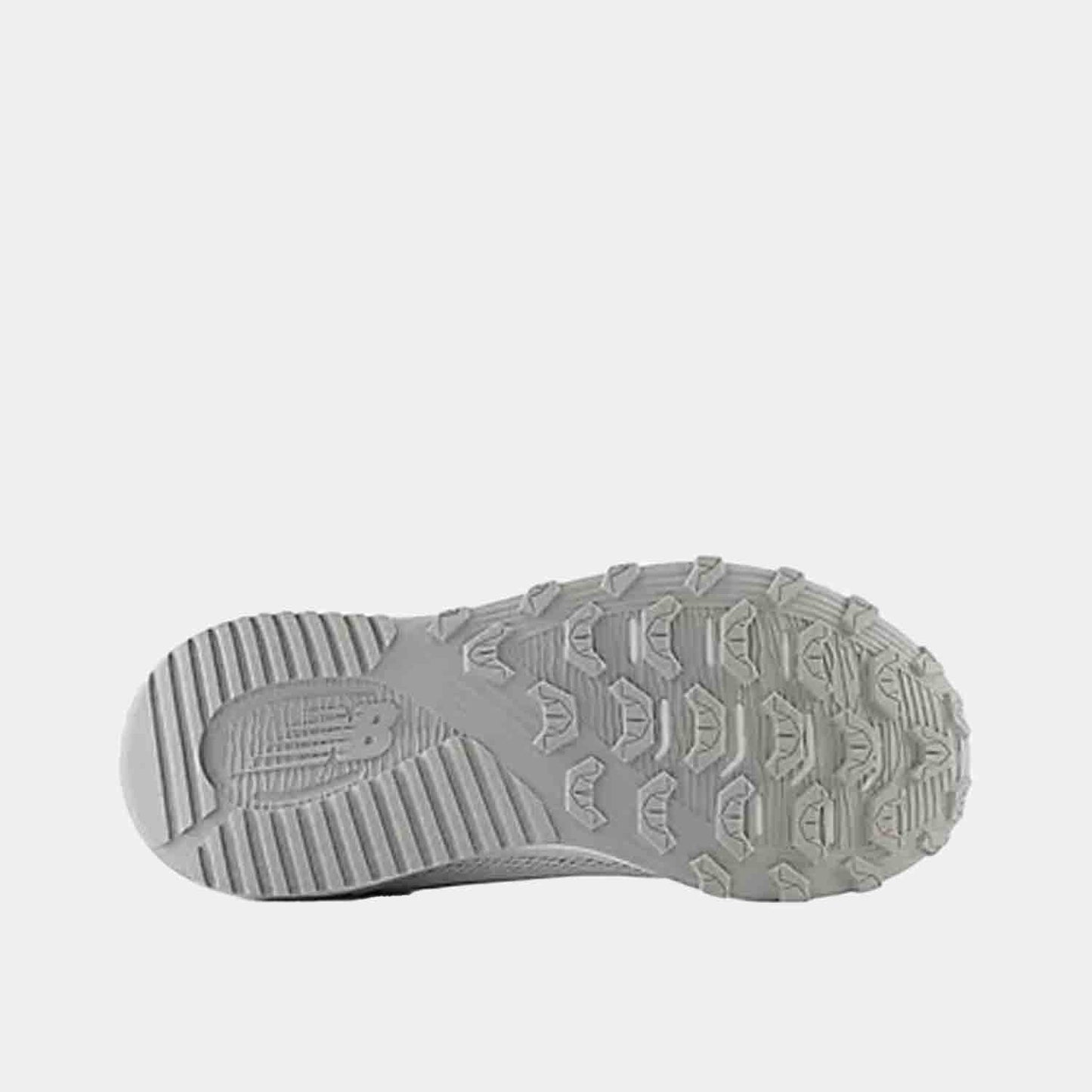 Bottom view of Kids' New Balance FuelCell v7 Baseball Turf Shoes.