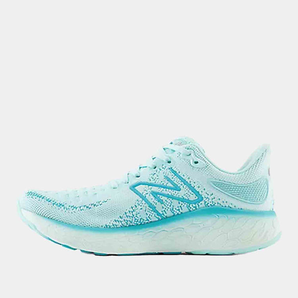 Side medial view of the Women's New Balance Fresh Foam X 1080v12 Running Shoes.