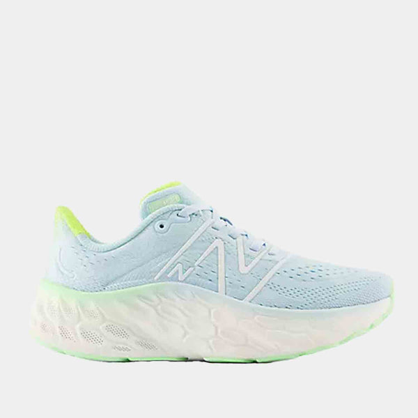 Side view of the Women's New Balance Fresh Foam X More v4 Running Shoes.