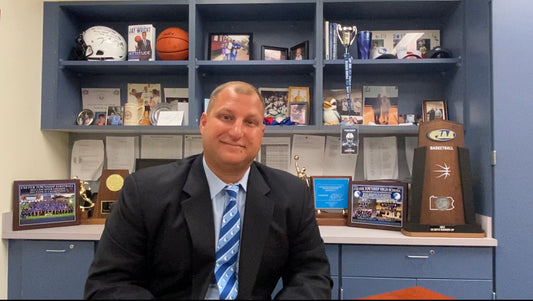Exeter athletic director Tom Legath