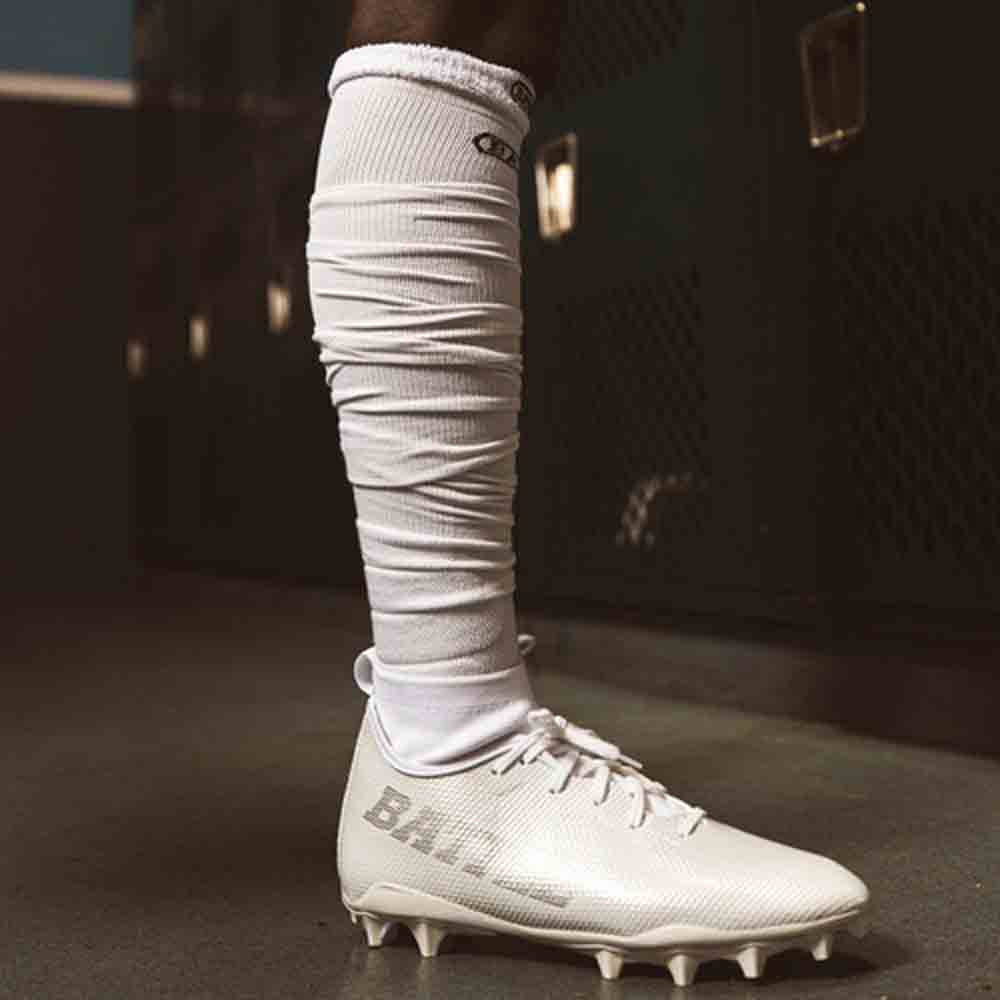 Side view of the Battle Adult White Long Football Socks.