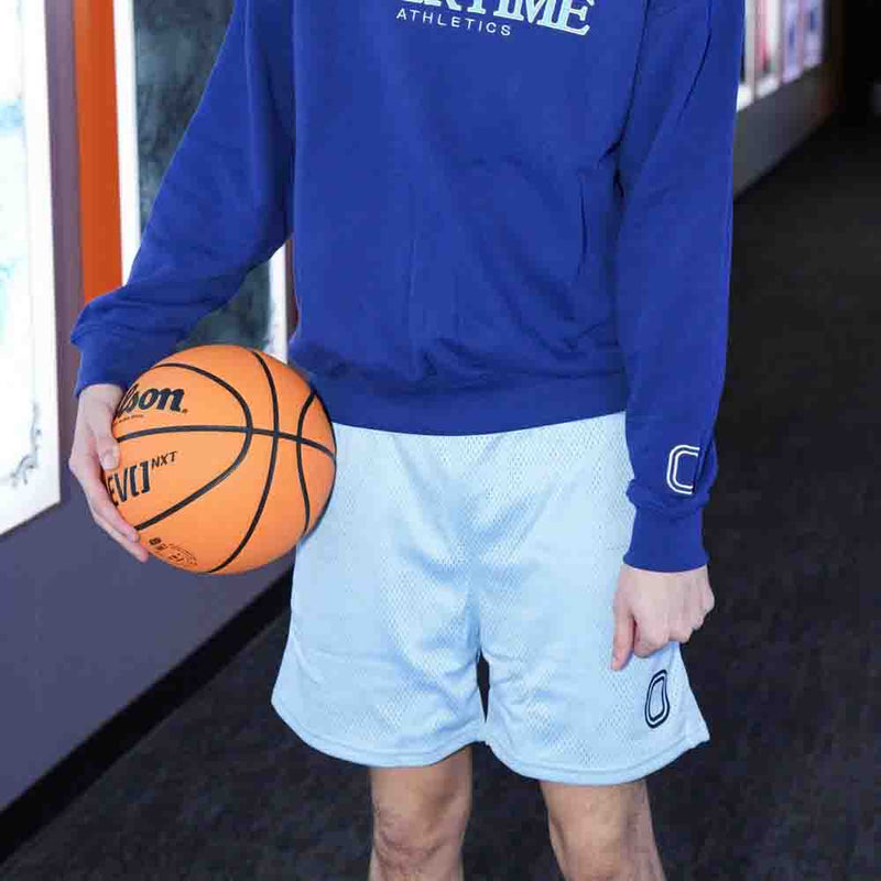 Front view of the Kids' Overtime Mesh Shorts.