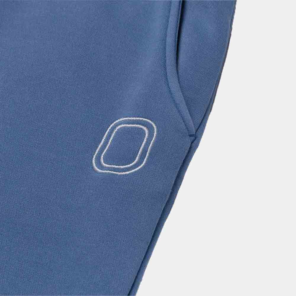 Up close view of emblem on the Overtime Classic Jogger.