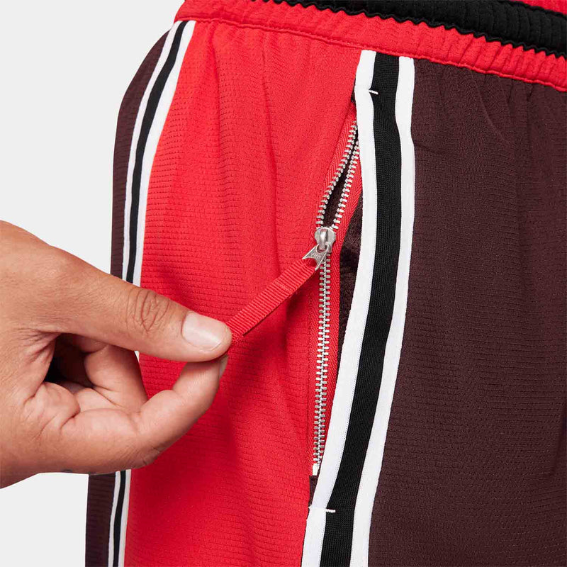 Up close view of zip up pocket on the Nike Men's Dri-FIT DNA+ 8" Basketball Shorts.