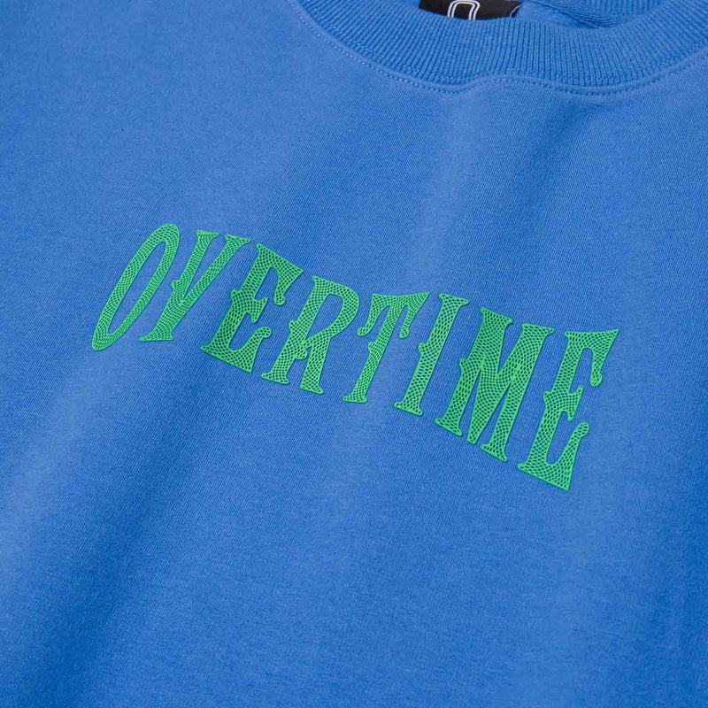 Up close view of logo on the Overtime Dollar And A Dream Crew.