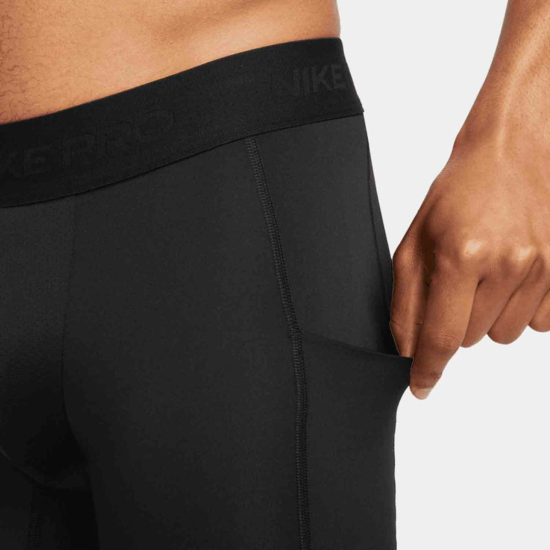 Up close view of side pocket on the Men's Nike Dri-FIT Fitness Long Shorts.