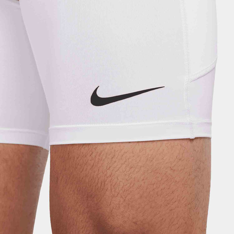 Up close view of emblem on the Men's Nike Dri-FIT Fitness Long Shorts.