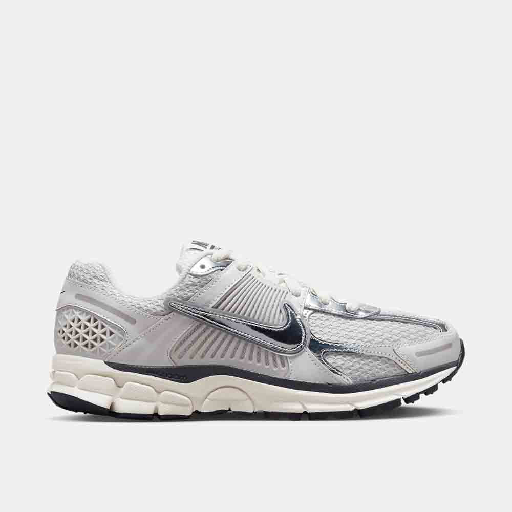 Side view of the Nike Women's Zoom Vomero 5.