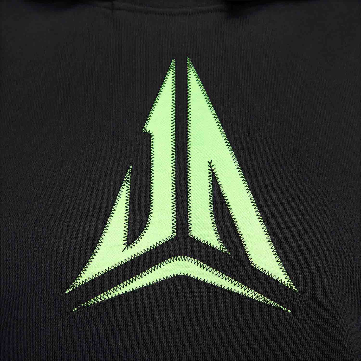 Up close, front view of logo on the Nike Men's Dri-FIT Pullover Basketball Hoodie.