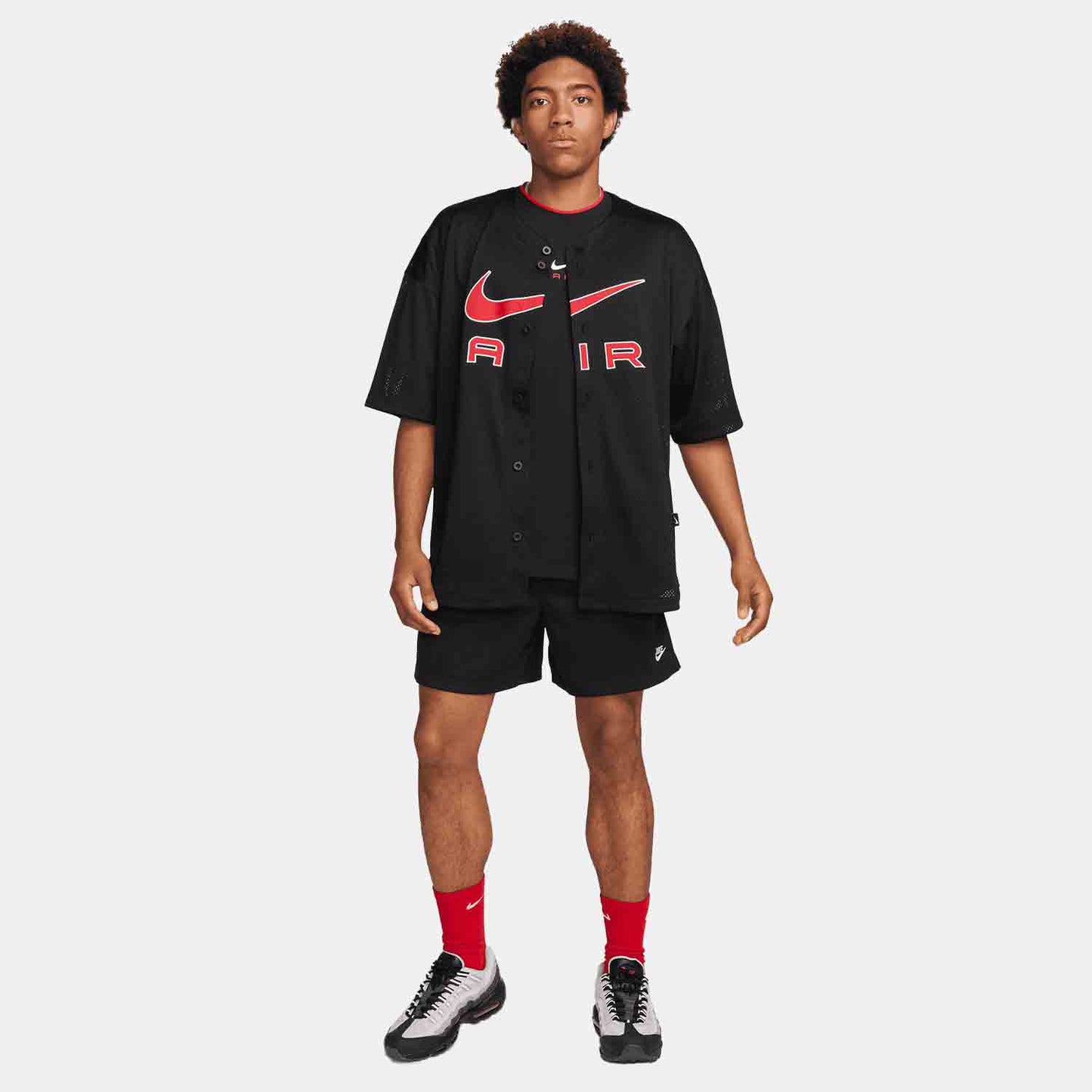 Full body view wearing the Men's Mesh Flow Shorts.