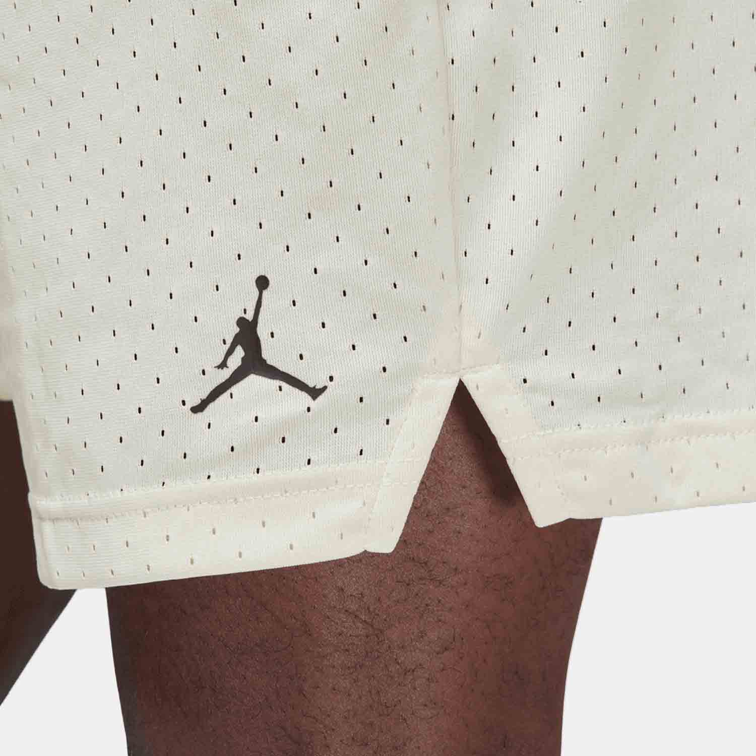 Up close view of emblem on the Men's Jordan Sport Mesh Shorts.