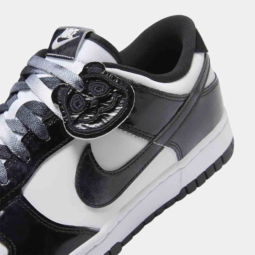 Up close, side view of the Nike Dunk Low Retro SE.