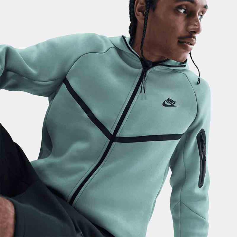 Up close, front view of the Men's Nike Tech Full-Zip Hoodie.