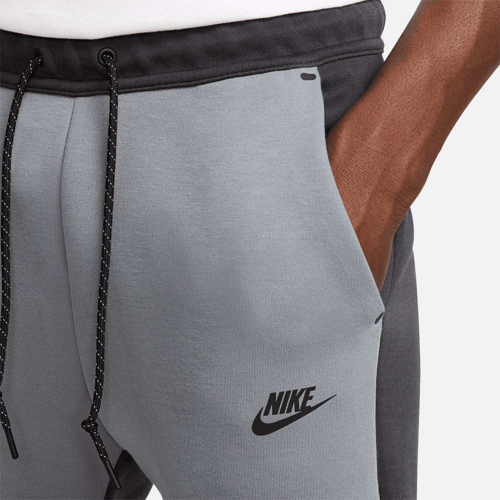 Up close, side view of the Men's Nike Tech Fleece Joggers.