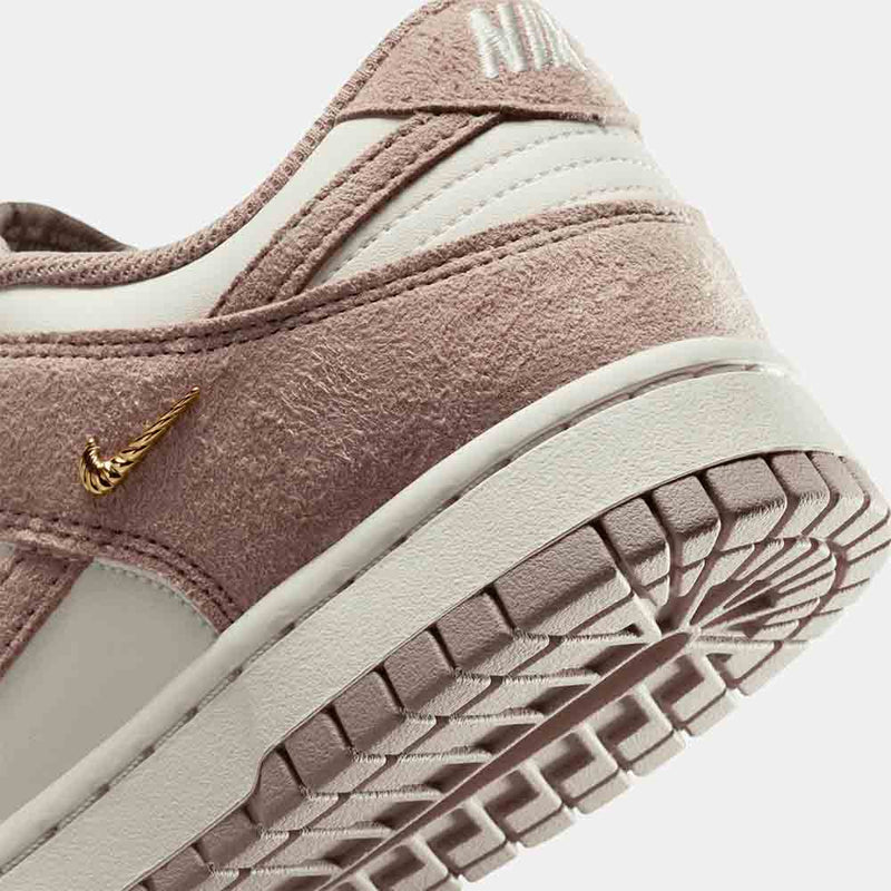 Up close, rear view of the Women's Nike Dunk Low.