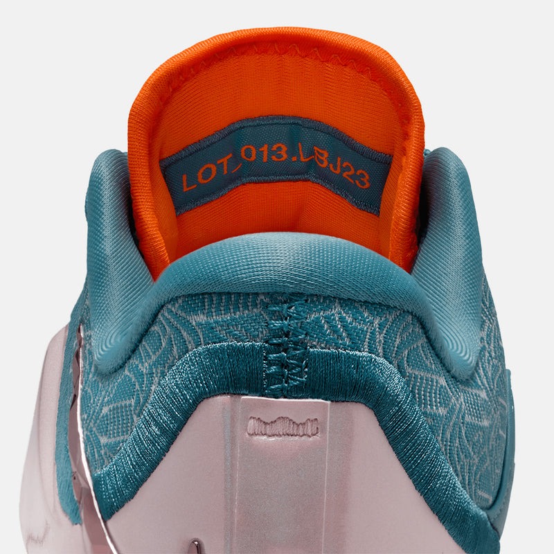 Up close, rear view of the Kids' LeBron XXIII "Miami Twice".