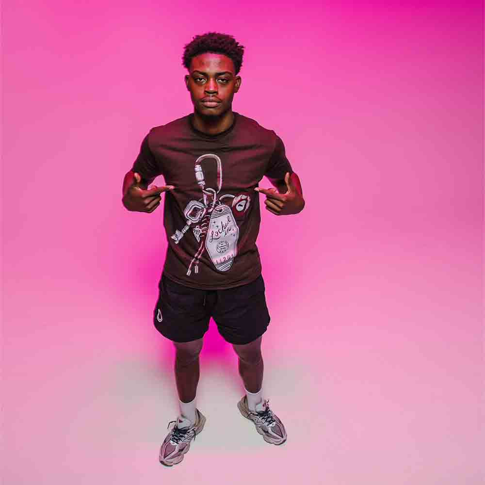 Front view of the Overtime Locked In Keychain Tee.