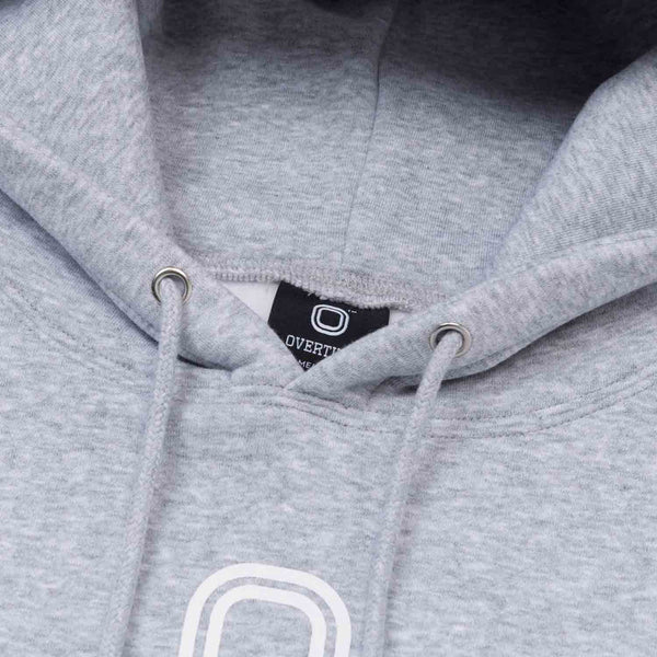 Up close view of emblem on the Overtime Classic 24 Hoodie.