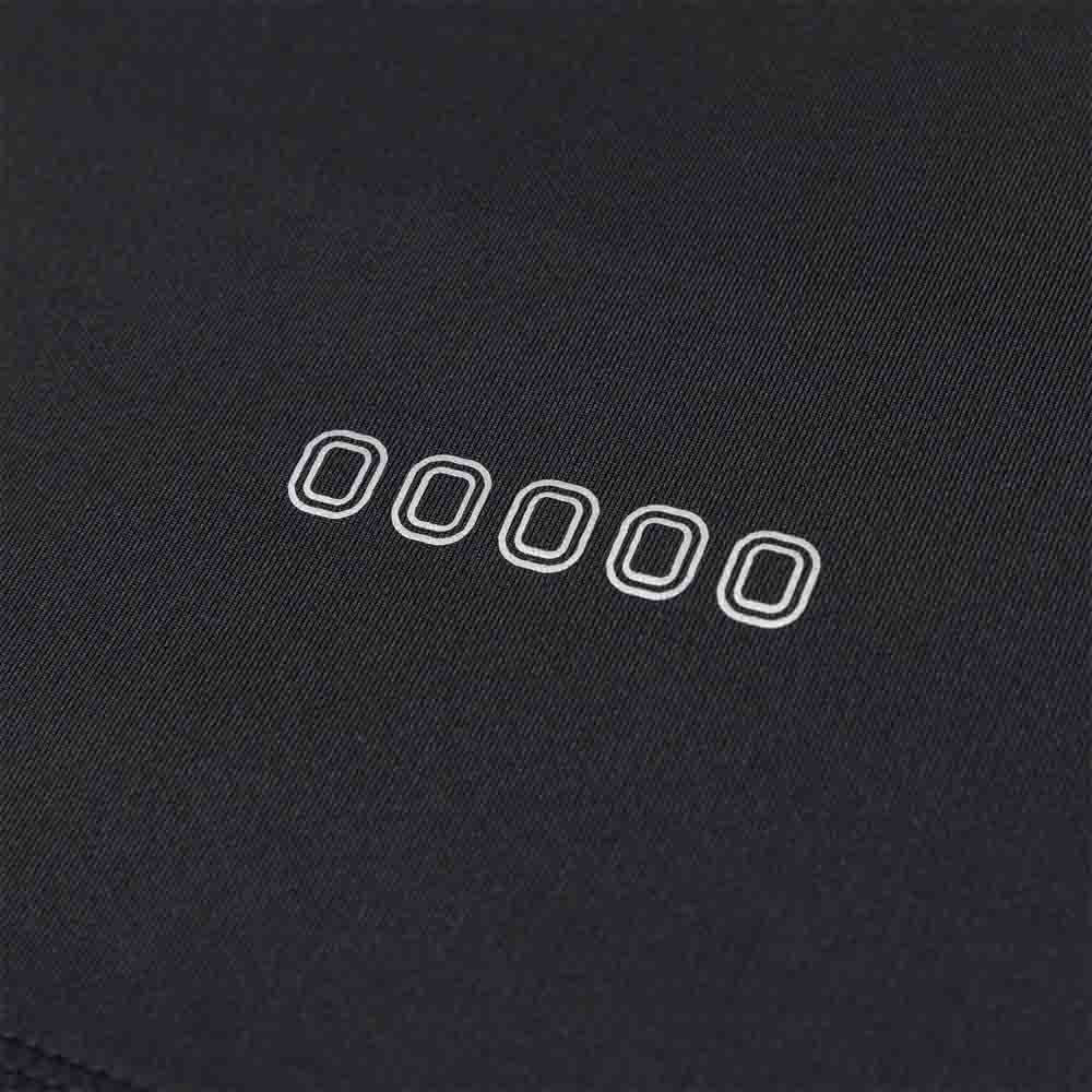 Up close view of emblems on the Overtime Kids' Valid Compression Tee.