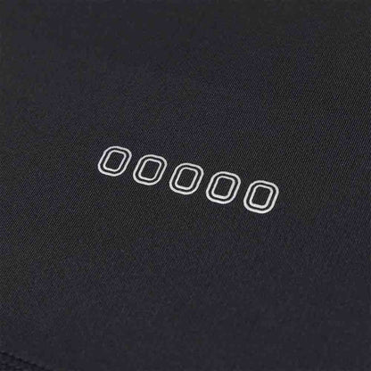 Up close view of emblems on the Overtime Kids' Valid Compression Tee.