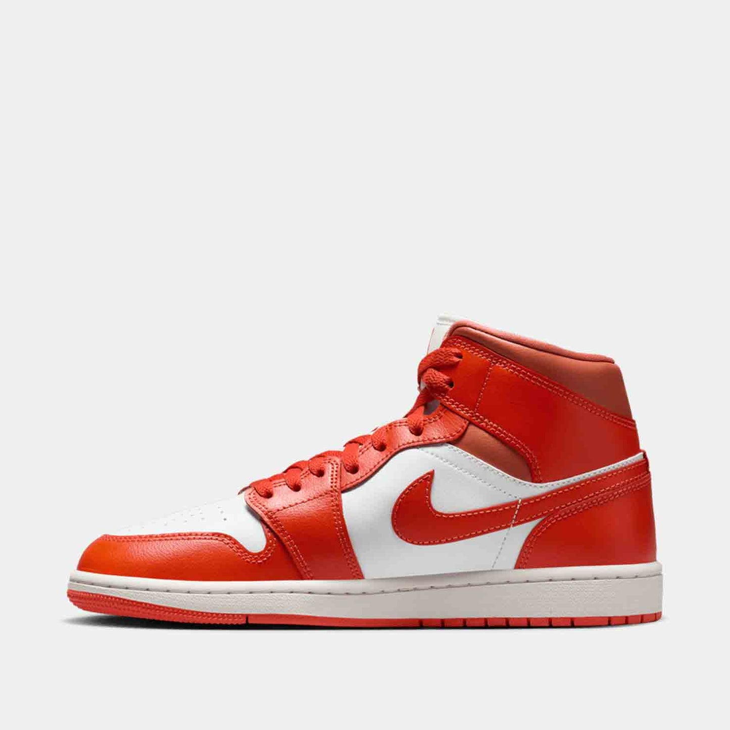Side medial view of the Women's Air Jordan 1 Mid.