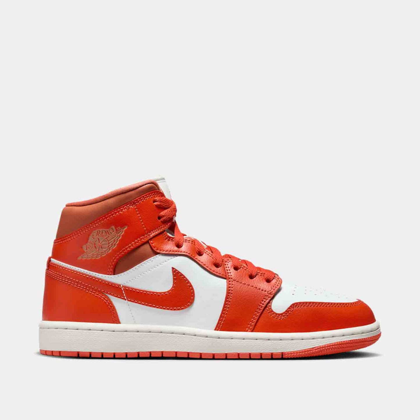 Side view of the Women's Air Jordan 1 Mid.
