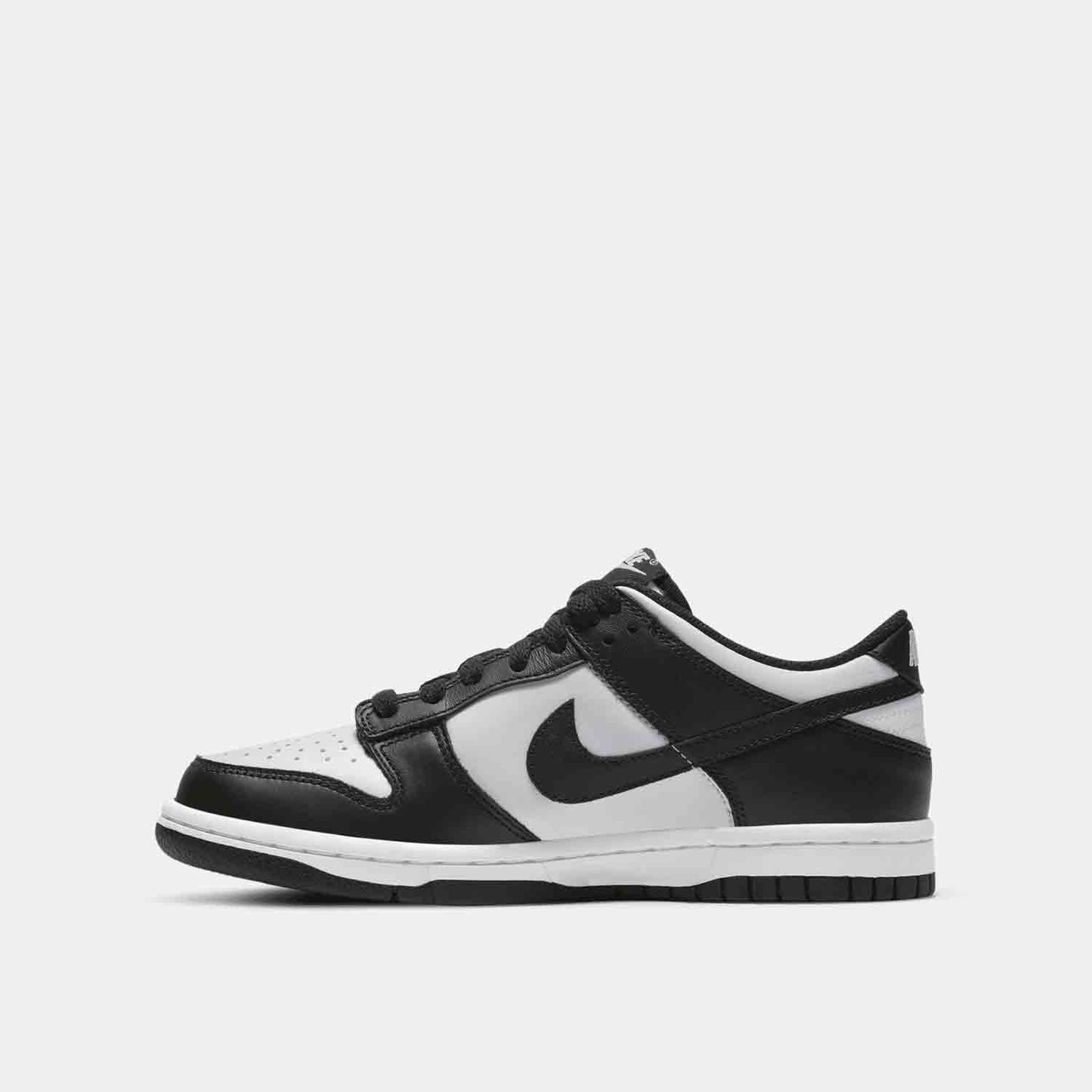 Side medial view of the Nike Kids' Dunk Low.