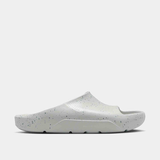 Side view of Men's Nike Post Slides.