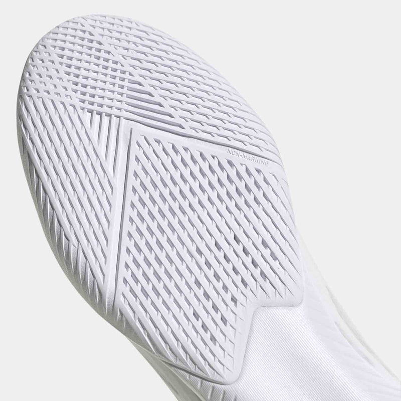 Up close bottom view of Adidas Men's X Speedflow Indoor Soccer Shoes.