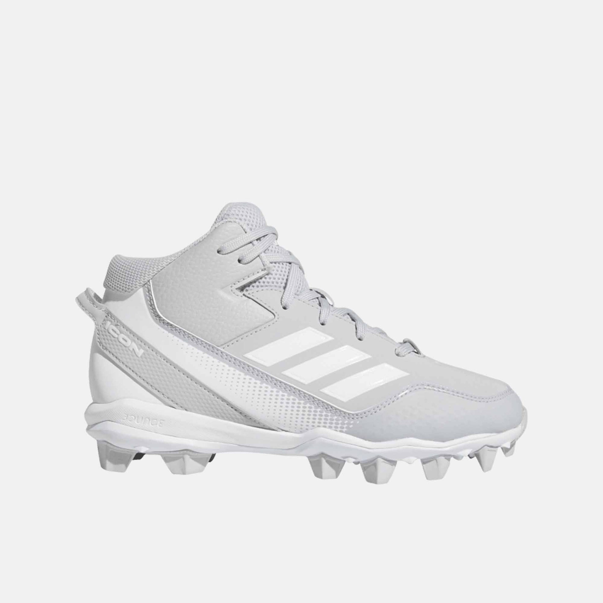 Side view of Adidas Kids' Icon 7 Mid Molded TPU Baseball Cleats.