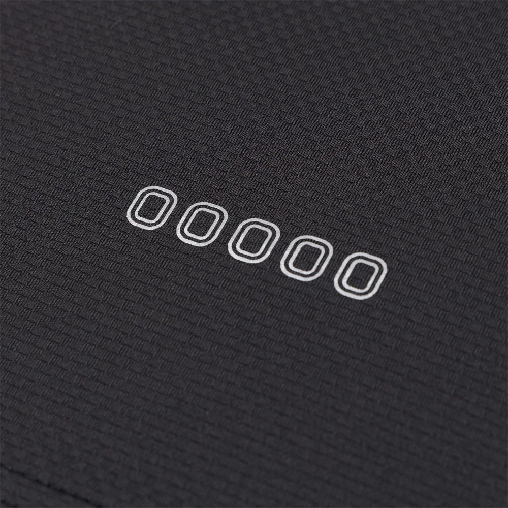 Up close view of emblem on the Overtime Tuff Performance Tee.