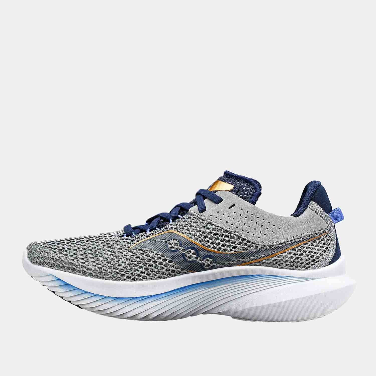 Side medial view of Women's Saucony Kinvara 14 Running Shoes.