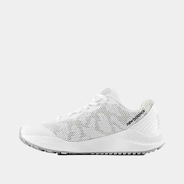 Side medial view of Kids' New Balance FuelCell v7 Baseball Turf Shoes.