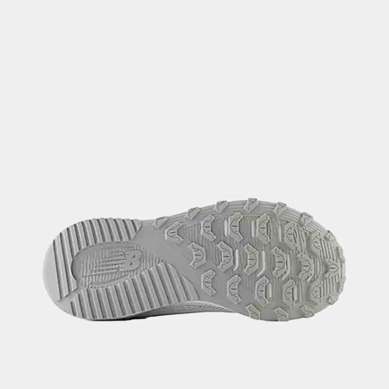 Bottom view of Kids' New Balance FuelCell v7 Baseball Turf Shoes.