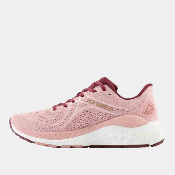 Side medial view of the Women's New Balance Fresh Foam X 860v13 Running Shoes.