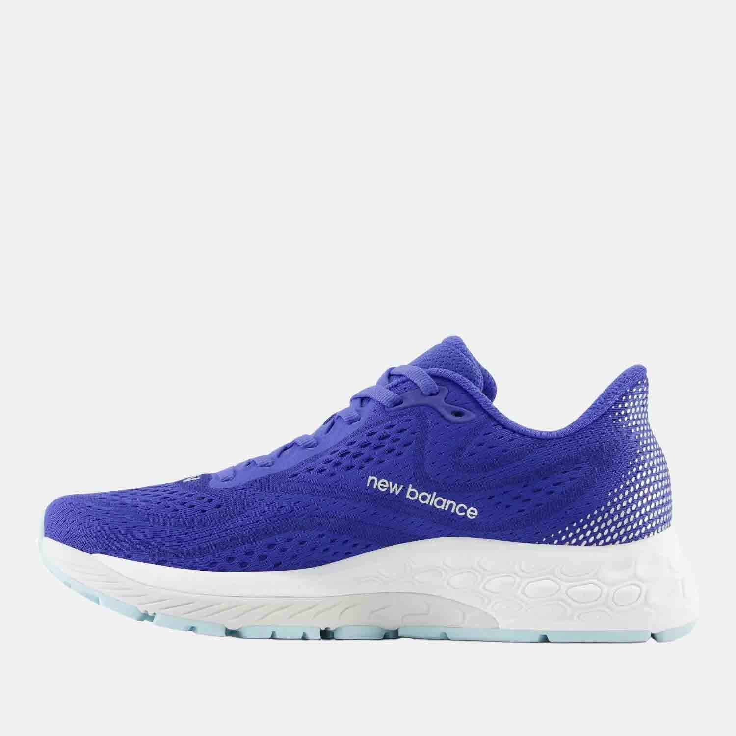 Side medial view of the Women's New Balance Fresh Foam X 880v13 Running Shoes.